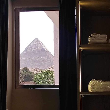 Global Pyramids Hotel Kafret el-Gabal Exteriör bild